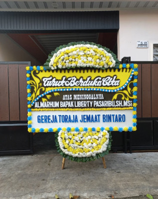 Papan Bunga Duka di Candibinangun